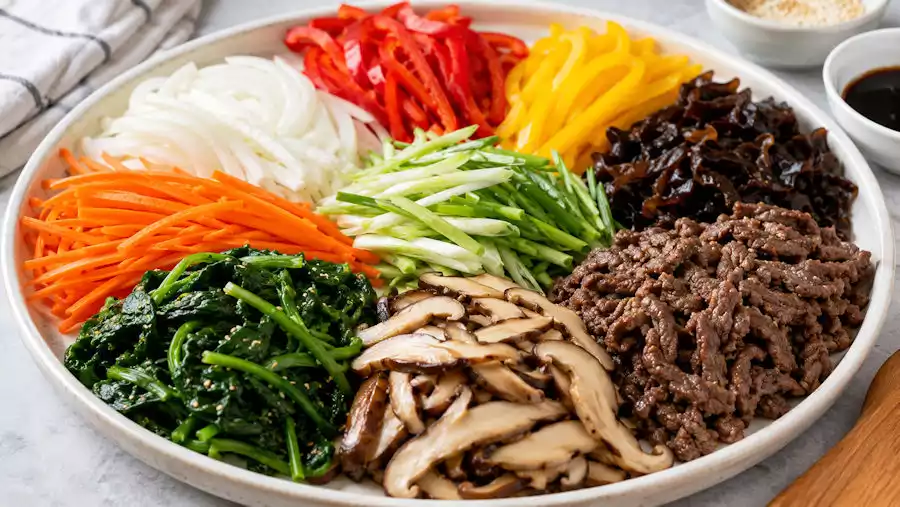 The Ultimate Guide to Japchae: Korea’s Beloved Glass Noodles | 잡채 4 Japchae ingredients close up