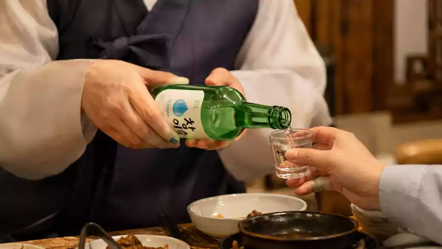 The Ultimate Guide to Korean Soju Culture: Drink Like a Local 2 Soju culture etiquette guide