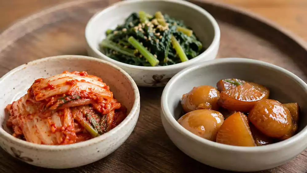 Why Are There So Many Korean Banchan? The Secret Behind Korean Side Dishes(반찬) 2 Diverse Korean Banchan in small traditional bowls