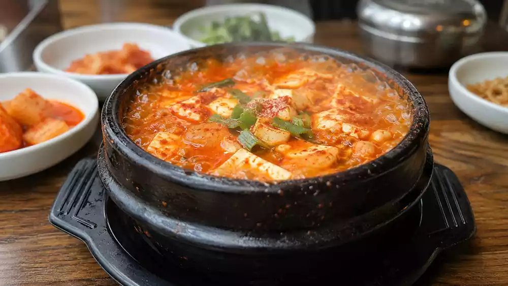 The Ultimate Guide to Sundubu Jjigae: Korea’s Famous Spicy Soft Tofu Stew | 순두부찌개 5 Sundubu Jjigae ttukbaegi pot