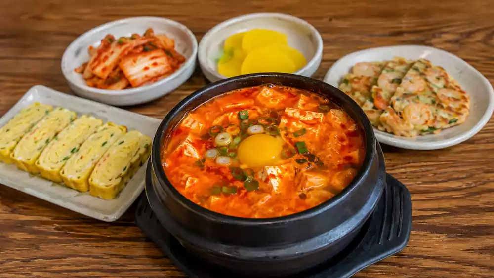 The Ultimate Guide to Sundubu Jjigae: Korea’s Famous Spicy Soft Tofu Stew | 순두부찌개 7 Sundubu Jjigae side dishes